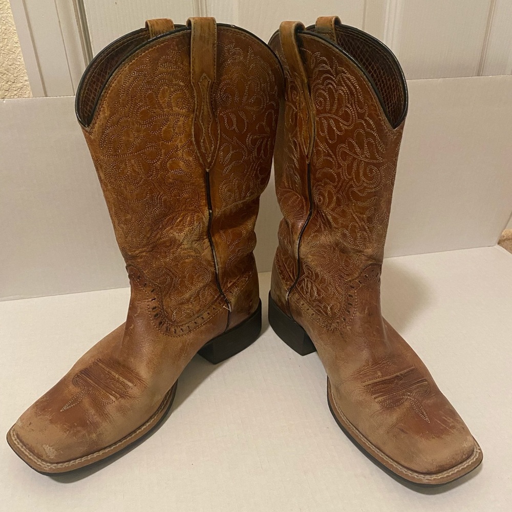 Ariat square toe cowboy boots.